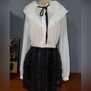 Chic White Blouse with Black Sequin Skirt
